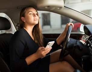 Téléphone au volant et infraction = suspension du permis de conduire